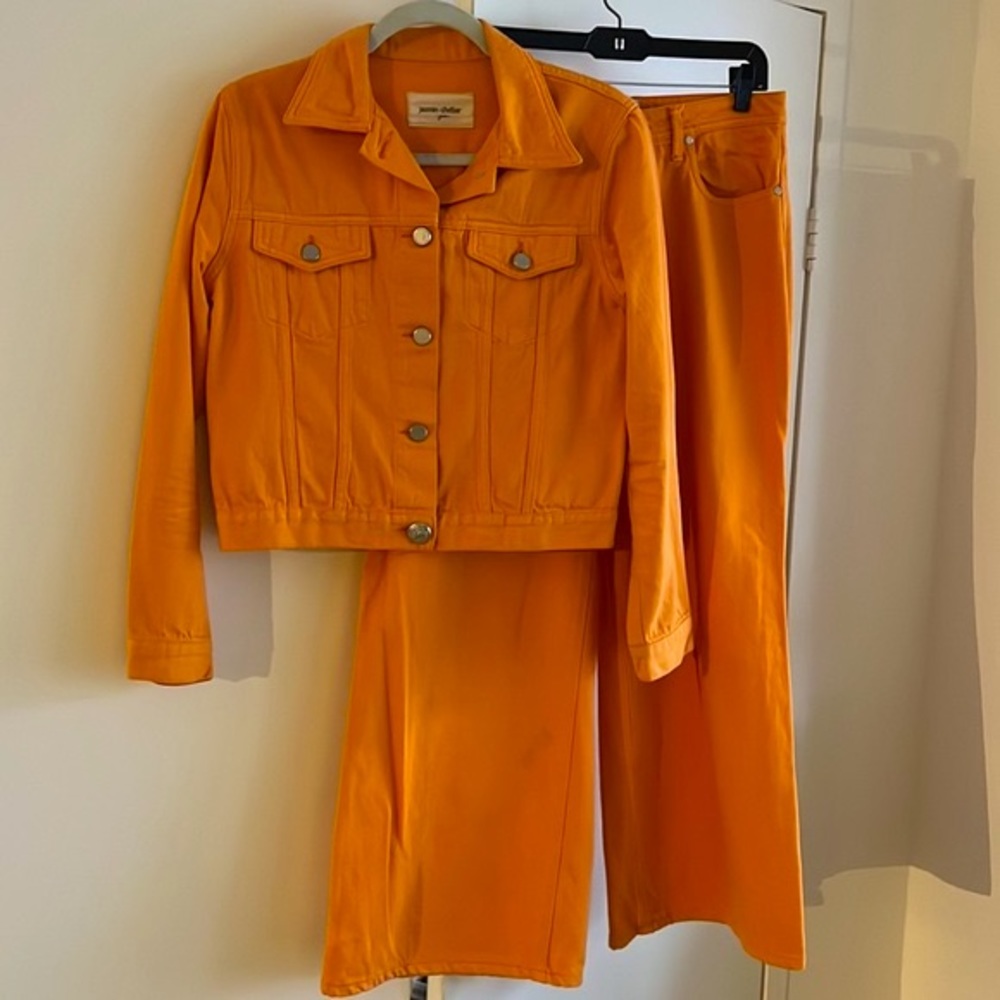 Orange denim jean jacket. Luxury brand. Size M